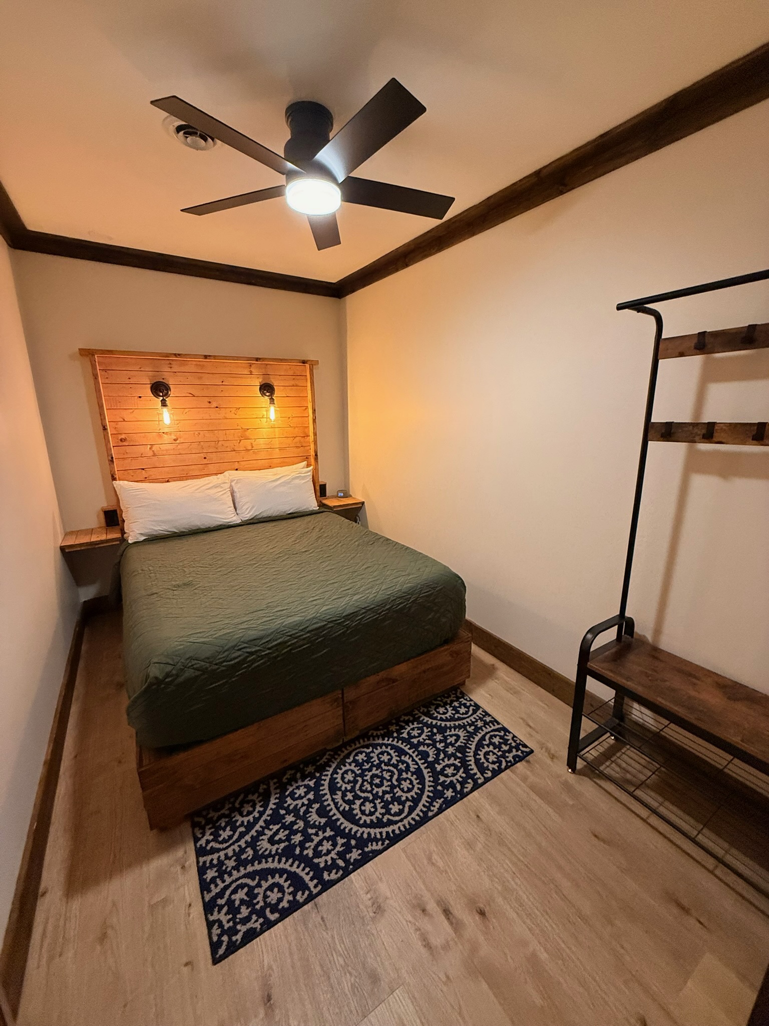 Suite 107 interior queen bedroom